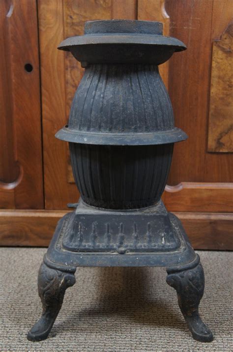 Antique Cast Iron Wood Burning Pot Belly Stove Railroad Sad Iron Stove Hook For Sale At 1stdibs