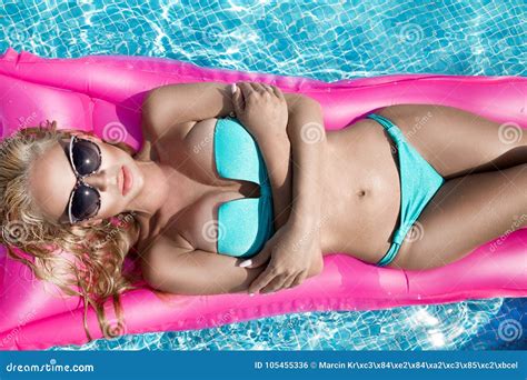 Beautiful Model Model With Long Blonde Wet Hairs Sunglasses And Bikini