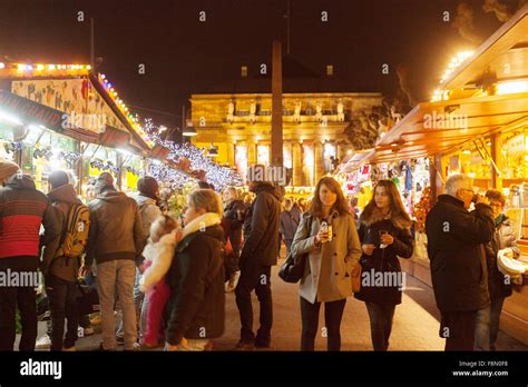 People Shopping At Strasbourg Christmas Market In Front Of The Opera