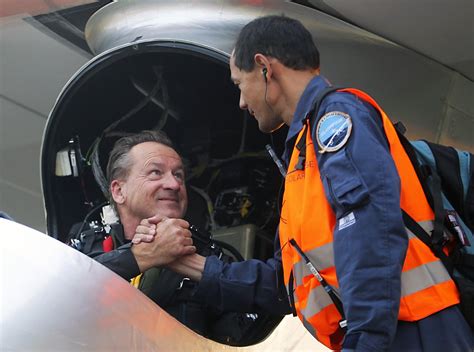 Pilot And CEO Of Solar Impuls Andre Borschberg Smiles As He Poses Next