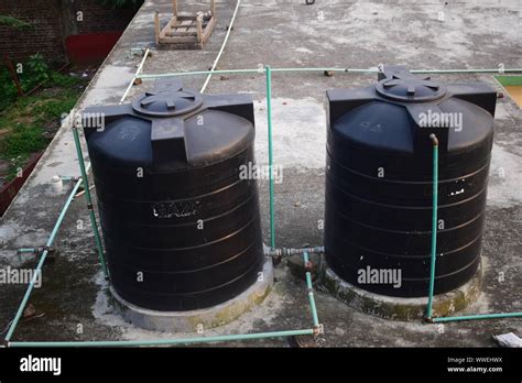 Water Tank On Rooftop Stock Photo Alamy