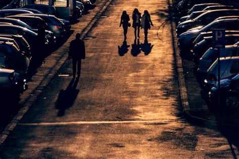 Premium Photo High Angle View Of People Walking On Road