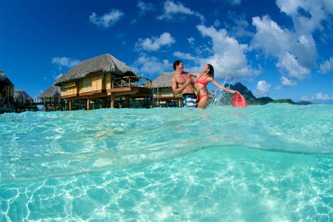 603c146775a6f48acd3b9ad0_le-bora-bora-by-pearl-resorts-couple-lagoon-24.jpg