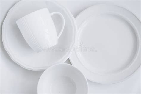 Set White Utensils Three Different Plates Cup Plate White Background