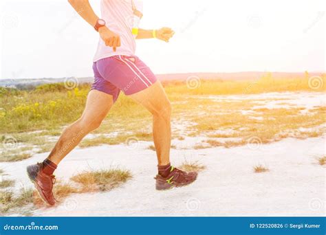 Legs Of Man Running On Sandy Ground Stock Photo Image Of Person