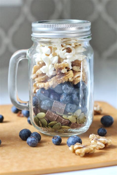 Homemade Popcorn Trail Mix With Blueberries Walnuts Seeds And Chocolate