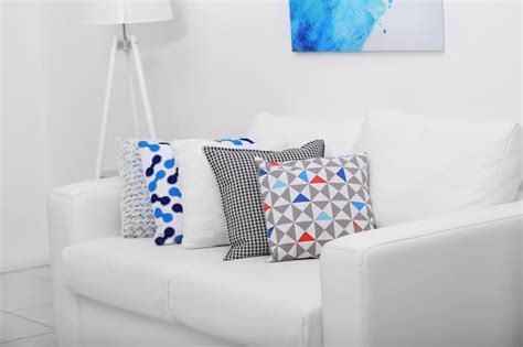 Premium Photo | Sofa with colorful pillows in room