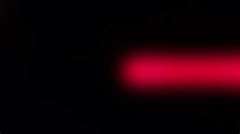 A moving red light on a black screen | Stock Video | Pond5