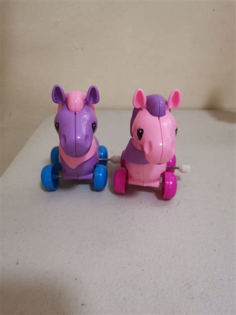 2 pcs Horse with wheels and winder, Hobbies & Toys, Toys & Games on Carousell