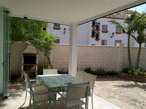 Cerramiento de Porche con Cortina de Cristal en Benalmadena Málaga