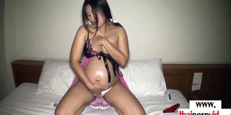 Amateur Pregnant Thai Slut Pat Oiling Her Big Belly And Dildoing Herself Tnaflix