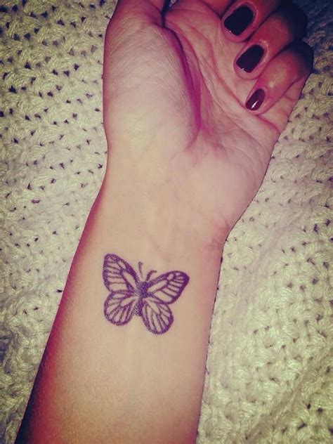 Beautiful gray ink butterfly wrist tattoo - Tattooimages.biz