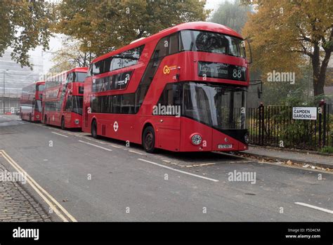 London New Red Routemaster Buses At A Stand In Camden Town Stock Photo