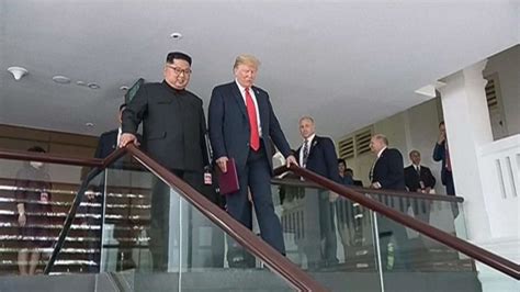 Trump seen in awkward exchange of salutes with North Korean general on ...