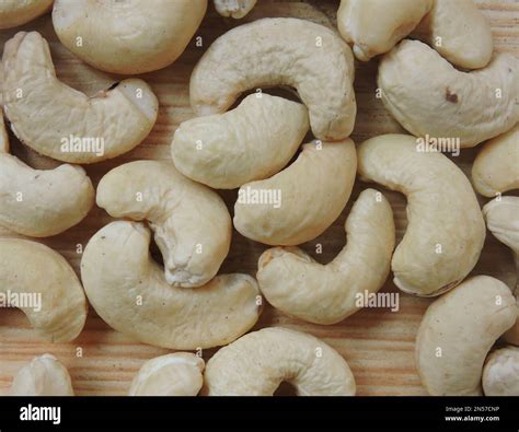 Cashew Nuts Are Seeds Produced From An Evergreen Tropical Tree Named