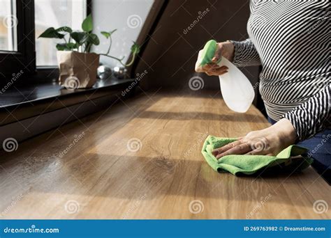 Cleaning the Home Table Disinfecting the Kitchen Table Stock Photo ...