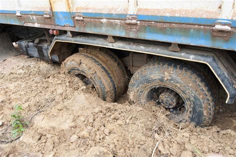 Tires down into the mud stock photo. Image of heavy, terrain - 60536304