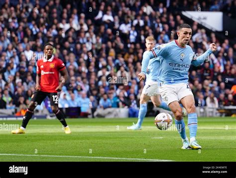 Manchester Citys Phil Foden Right Scores Their Sides First Goal Of