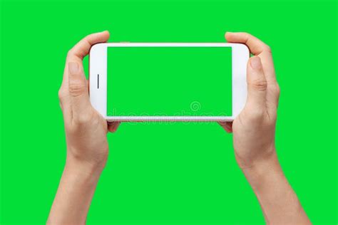 Woman Hand Shows Mobile Smartphone With Green Screen In Horizontal