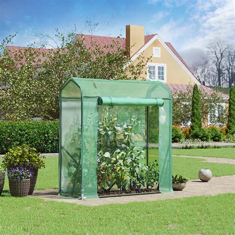 SONGMICS Serre de Jardin Abri avec Porte Enroulable pour légumes