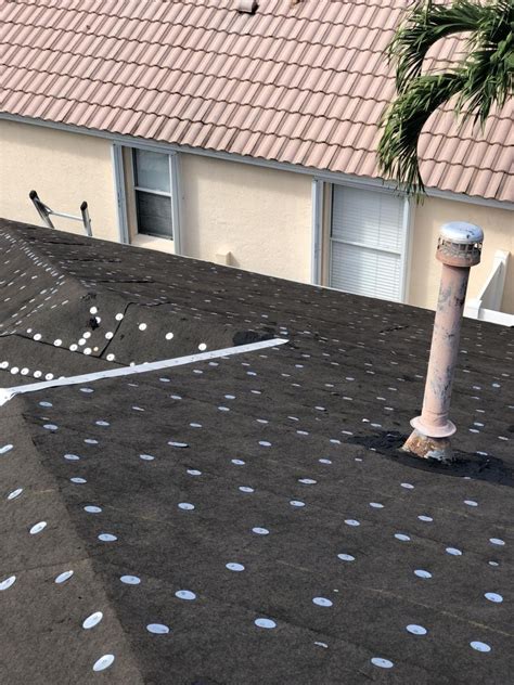 Modern Roofing Experts Llc Stuart Fl Installs Asphalt Metal Flat