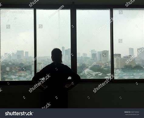 Woman Looking Rain Falling Through Window Stock Photo 500718304 ...