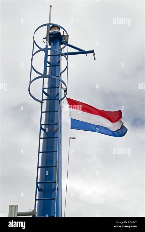 Red white flag on ship mast hi-res stock photography and images - Alamy