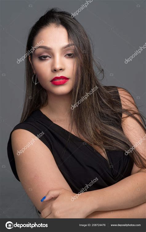 Female Hispanic Fashion Model Posing Studio Stock Photo by ©rmarmion ...