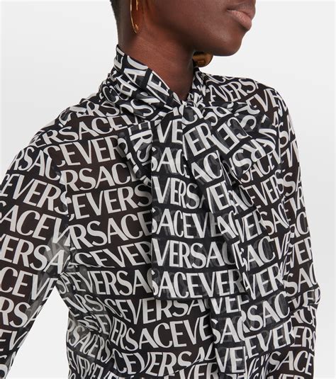 Logo-print silk shirt in black - Versace | Mytheresa