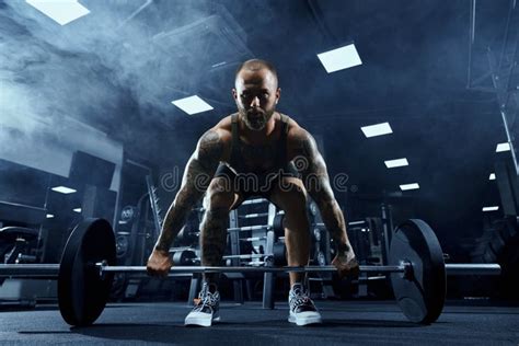 Muscular Sportsman With Naked Torso Posing Outdoors Stock Photo