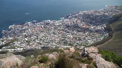 Coastal Cityscape Between Ocean And Mountains Aerial View Stock Video