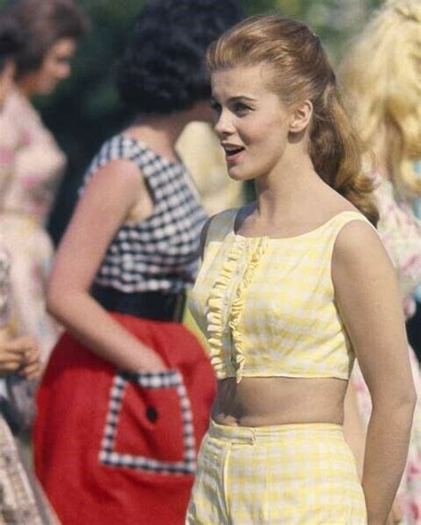 Ann Margret In Yellow Sleeveless Top And Bare And Similar Items