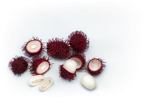 Hairy Tropical Rambutan Fruit Whole Half Cut Seed Flesh Isolated On