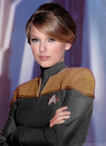 A Woman In A Star Trek Uniform Poses For A Photo