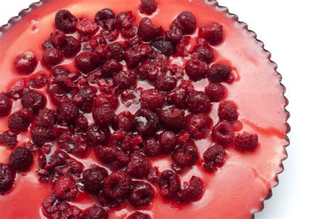 Cheesecake topped with raspberries - Free Stock Image