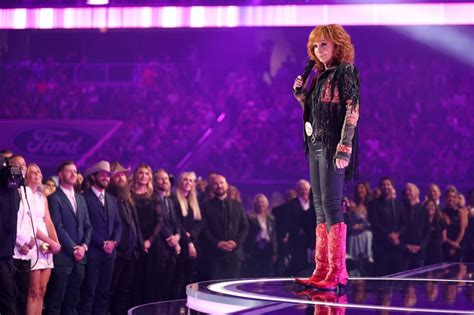 Reba McEntire Gets Red Hot in Cowboy Boots for 2024 ACM Awards ...