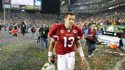 Arizona Cardinals Quarterback Kurt Warner Walks Off The, 56% OFF