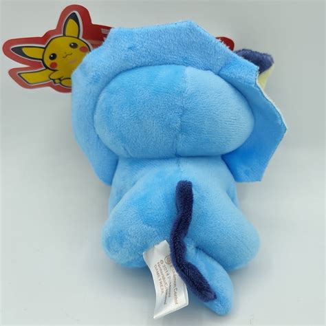 Pelúcia Pokémon Vaporeon Antialérgico 12cm Shark Power Games Um Mar