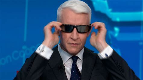 Anderson Cooper tries on sunglasses for solar eclipse | CNN