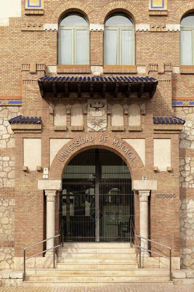 Malaga, Spain- 26-01-2024: Entrance of Universidad de Malaga with traditional brickwork, perfect ...