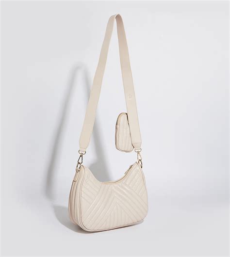 Buy Tyra Quilted Cross Body Bag With Coin Pouch In Beige Thstreet Uae