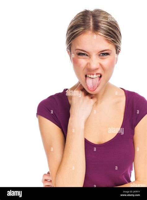 Portrait Of A Beautiful Woman Sticking Tongue Out Stock Photo Alamy