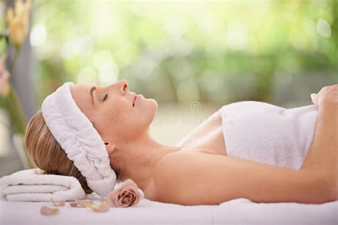 Sometimes You Just Need A Day At The Beauty Spa Cropped Shot Of A Woman In A Day Spa Relaxing