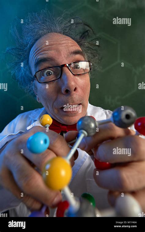 Crazy Scientist Studying The Molecular Structure Of The Molecule Model