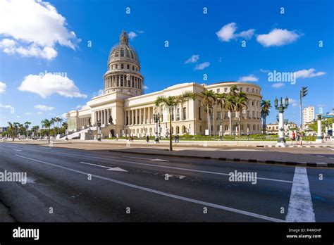 Old Havana Cuba Classic Vintage American Taxi Cars Pass In Front Of