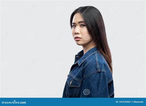 Profile Side View Portrait Of Calm Serious Beautiful Brunette Asian