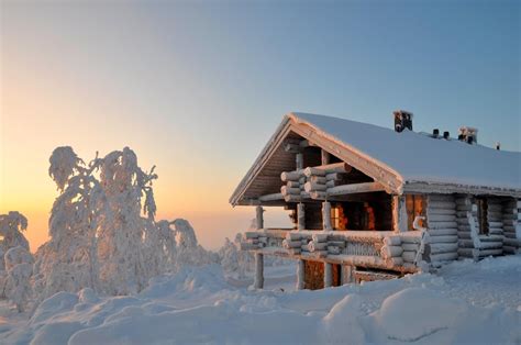 typical finnish cabin covered  snow  shot    lapland