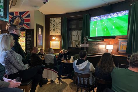 Pub revellers celebrate as Three Lions go marching on in World Cup ...