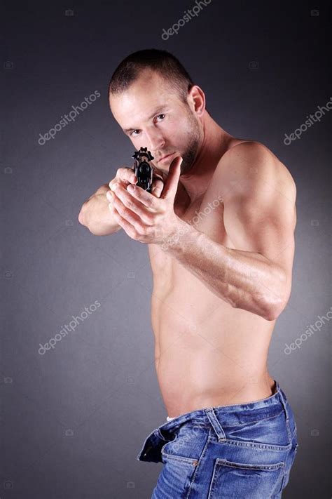 Naked Man With A Gun Stock Photo Nick Freund