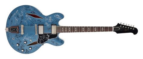 Guitars Signed By Dave Grohl Nile Rodgers Brian Johnson John Paul